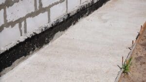 Foundation waterproofing vapor barrier